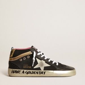 Black Mid-Star sneakers with gold-coloured inserts and glitter